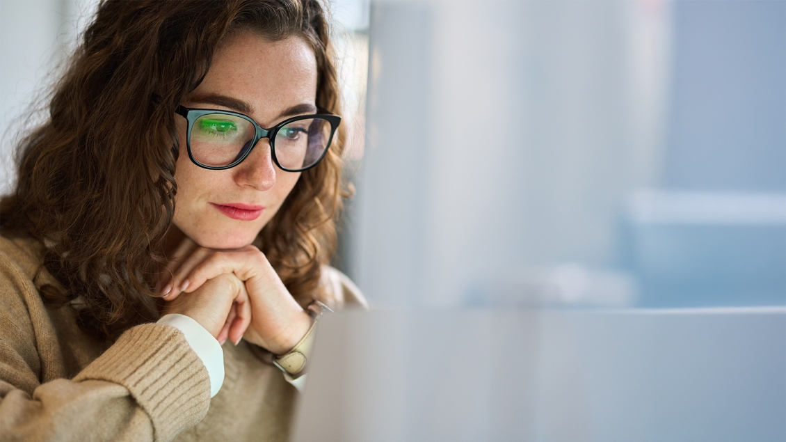woman looking at a computer