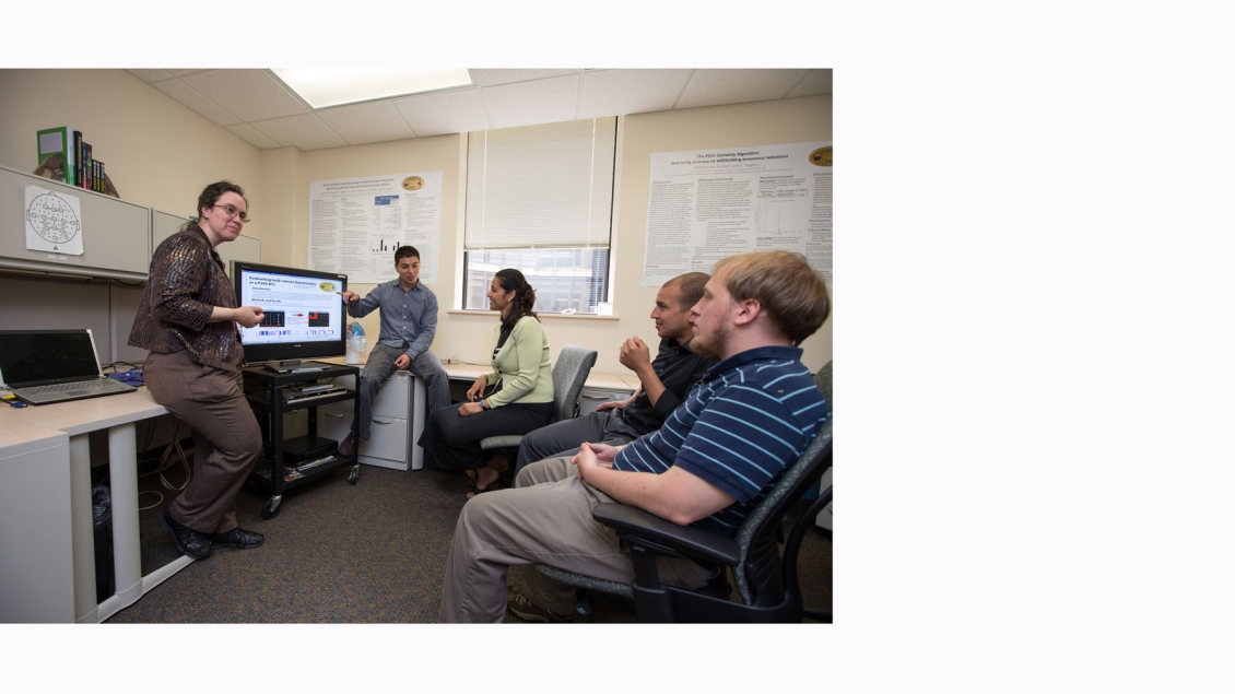 Dr. Jane E. Huggins discussing BCI algorithm with students.