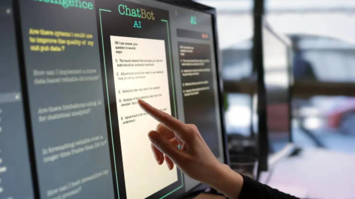 Person pointing at AI platform.