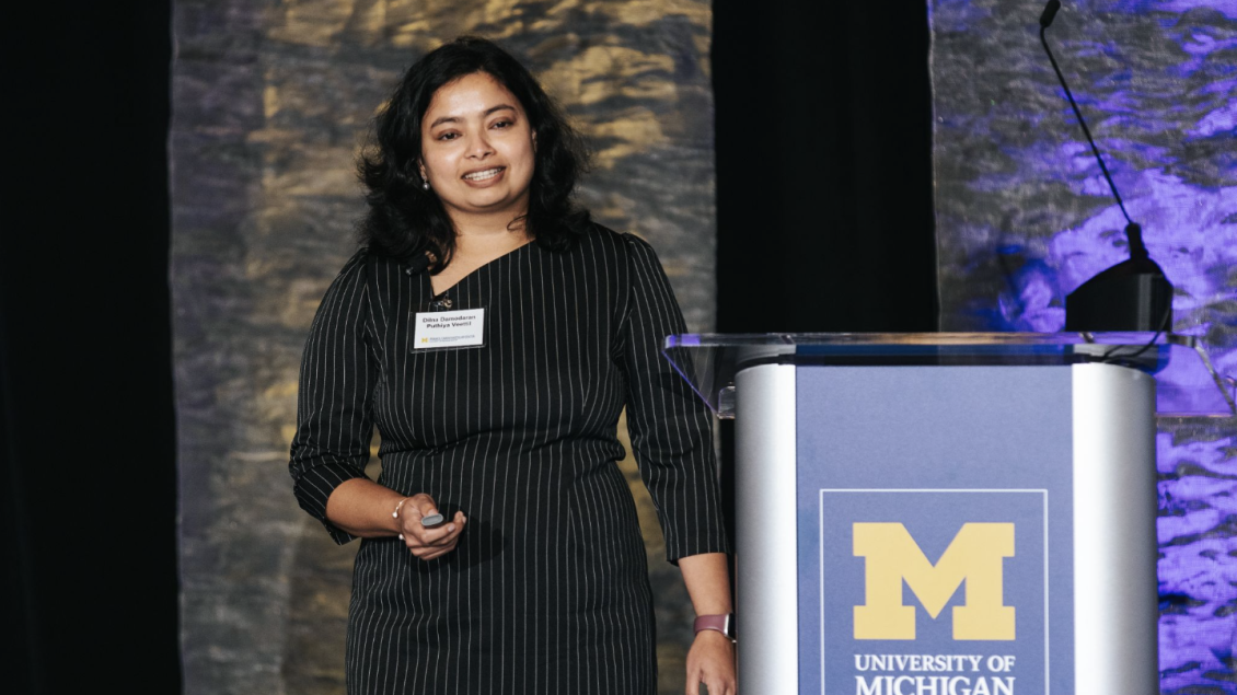 woman speaking at a conference