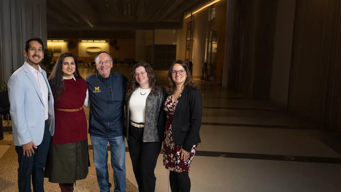 Dr. Steve Kunkel with the four research operations fellows for 2026