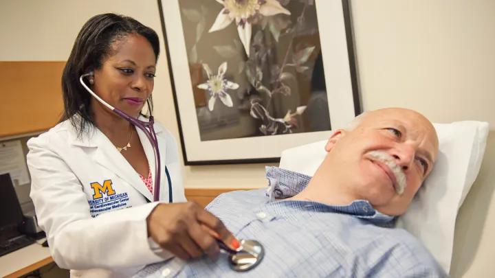 Doctor listening to a patient's heart