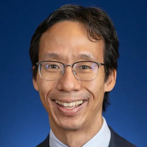 headshot of Andrew Tai