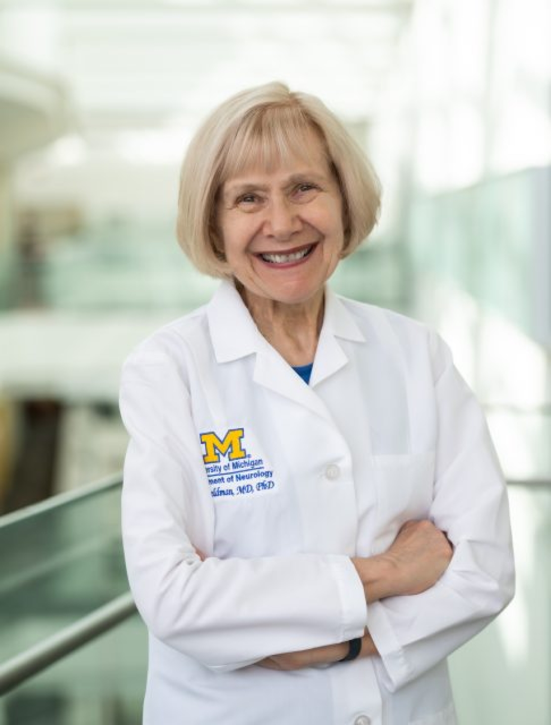 2022_eva-feldman-portrait-labcoat-bsrb-walkway