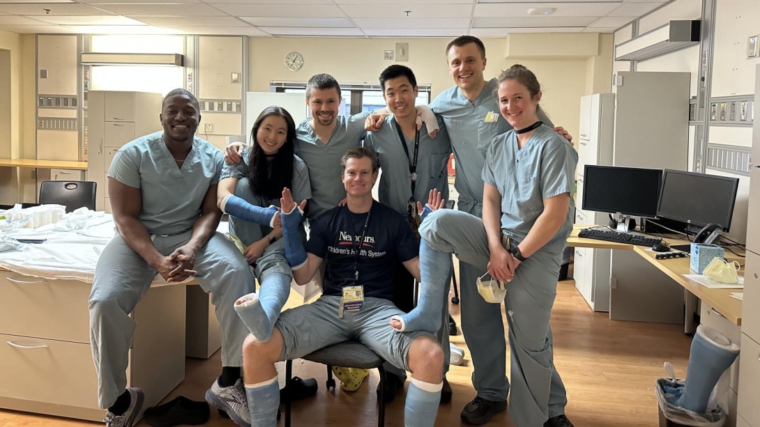 Group photo of doctors with casts on 