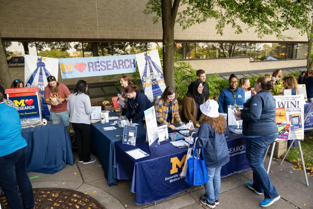 people at Researchpalooza event outdoors