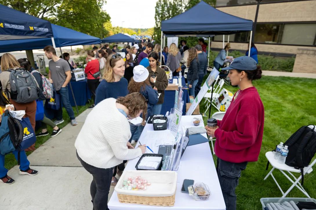 people at Researchpalooza event outdoors