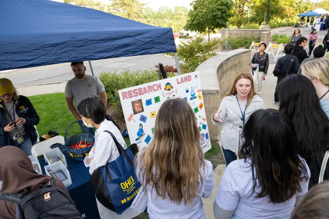 people at Researchpalooza event outdoors