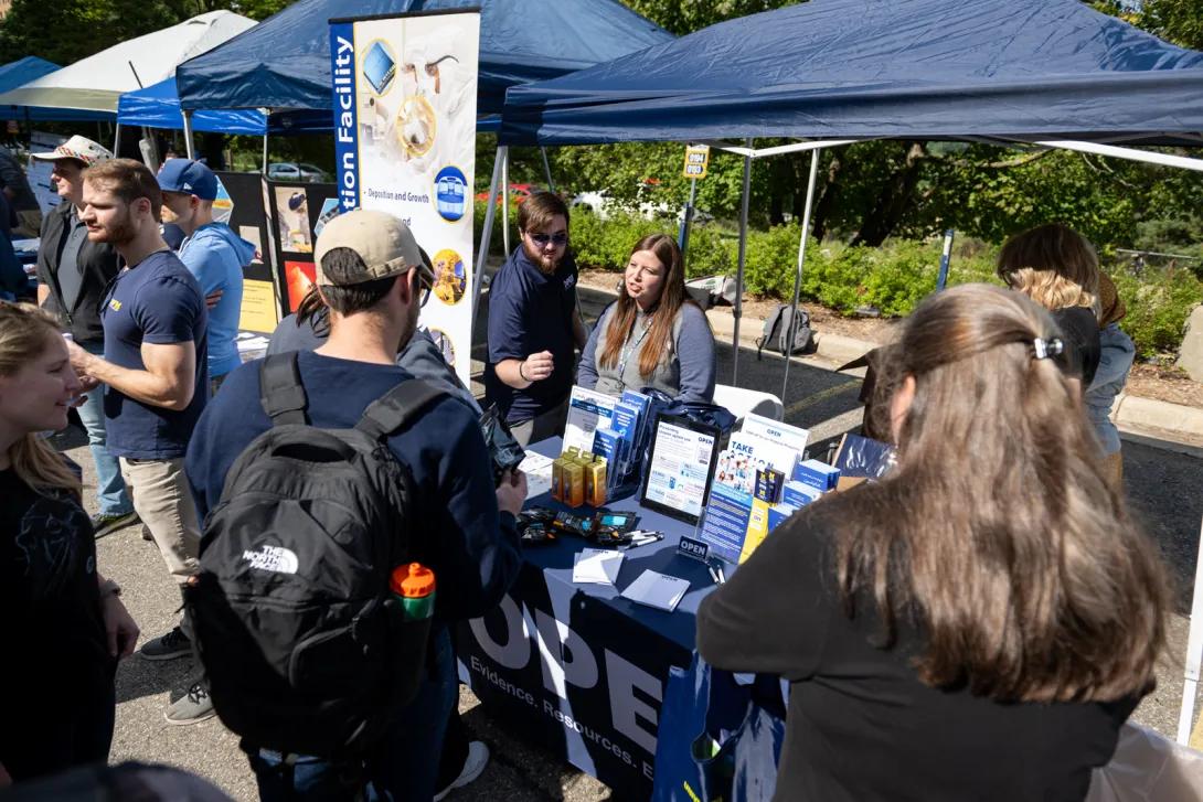 people at Researchpalooza event outdoors