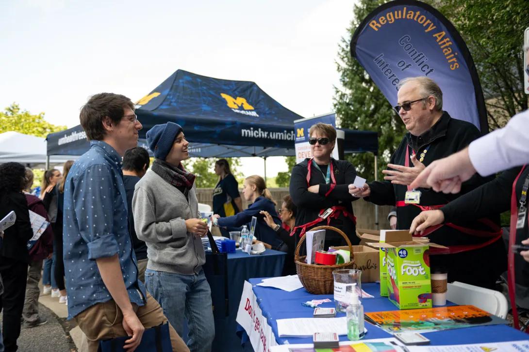people at Researchpalooza event outdoors