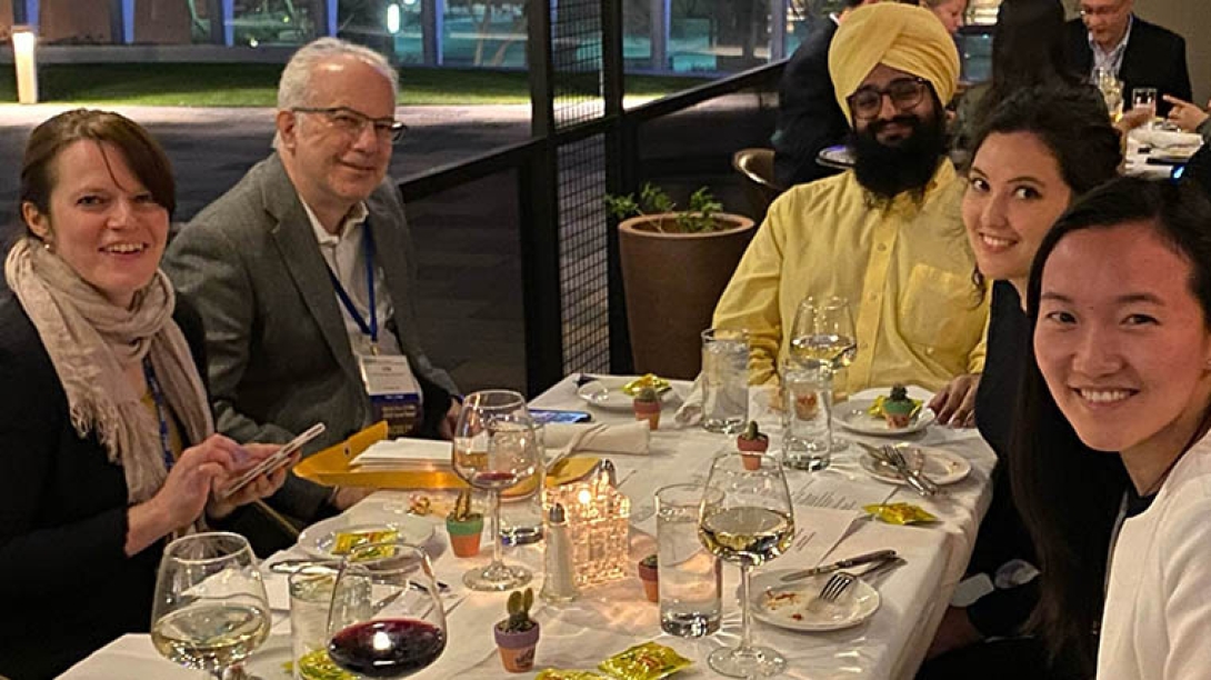 Allergy fellows pose for a photo at dinner