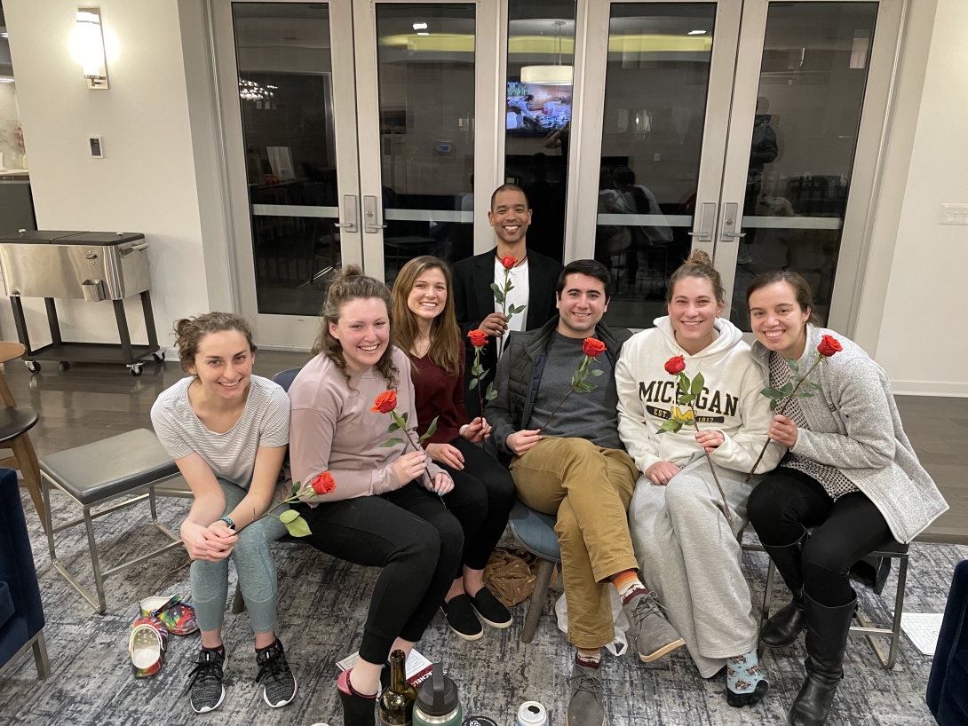 Medical staff smiles for a photo at a casual gathering