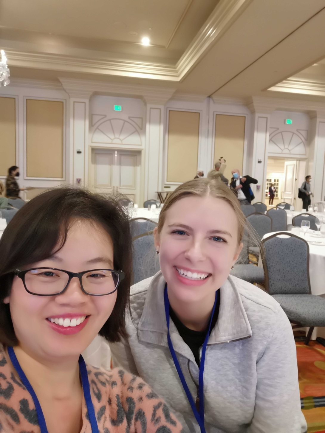 2 female lab members smiling in a photo 