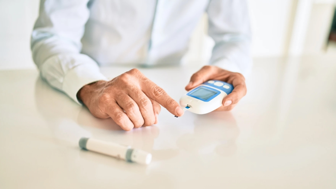 person testing for insulin