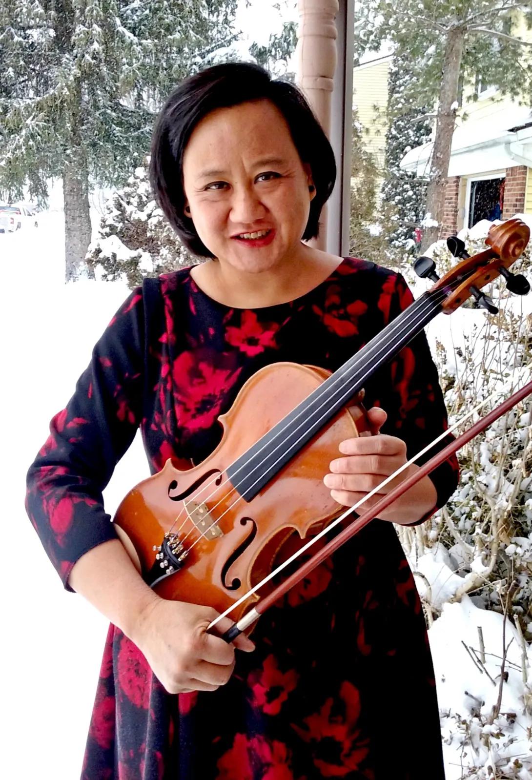 portrait of Hue Huynh