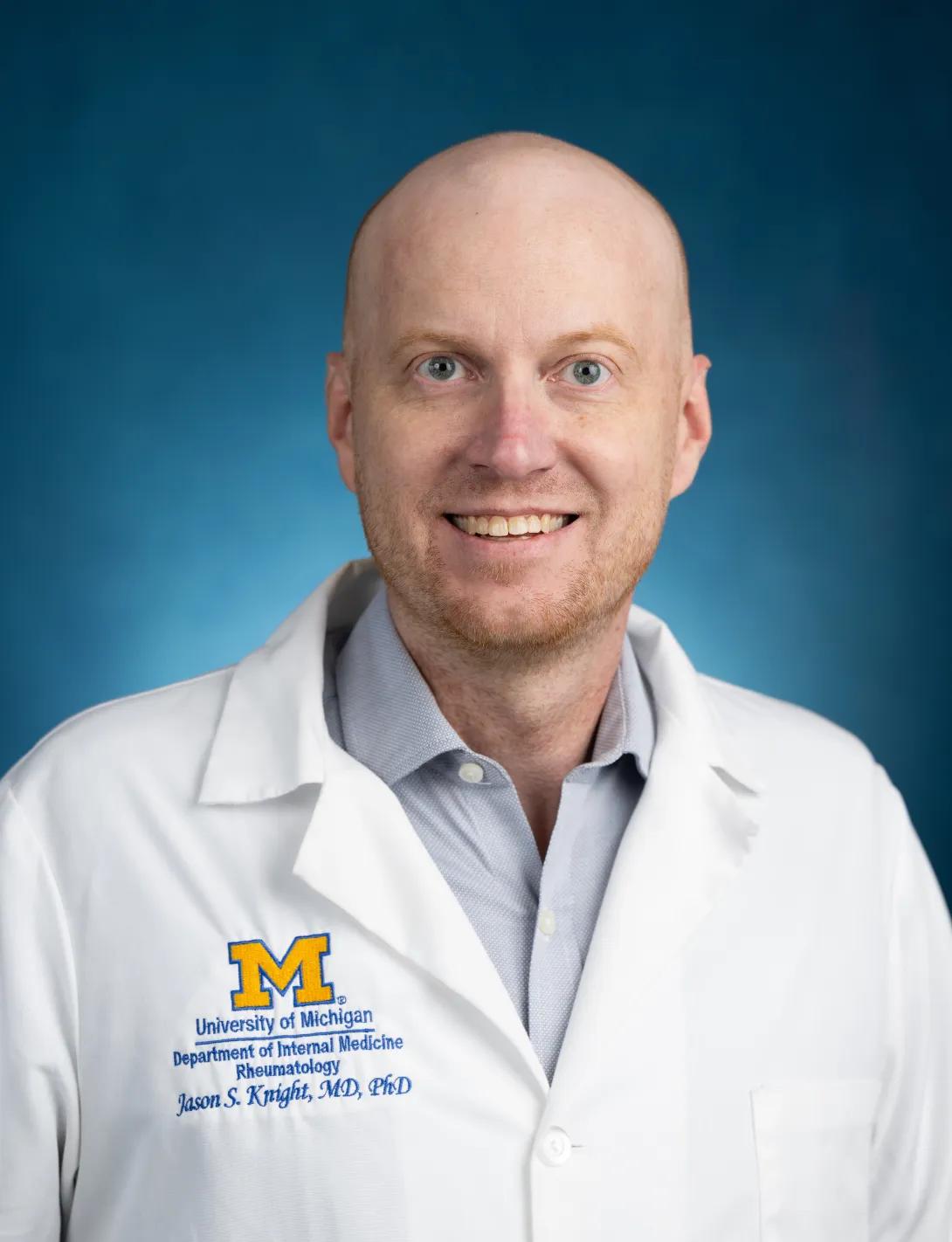 Jason Knight, MD, PhD White Coat Headshot