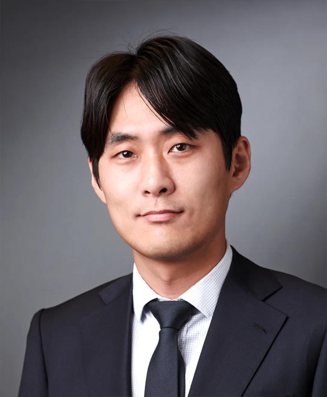 an Asian man with black hair 