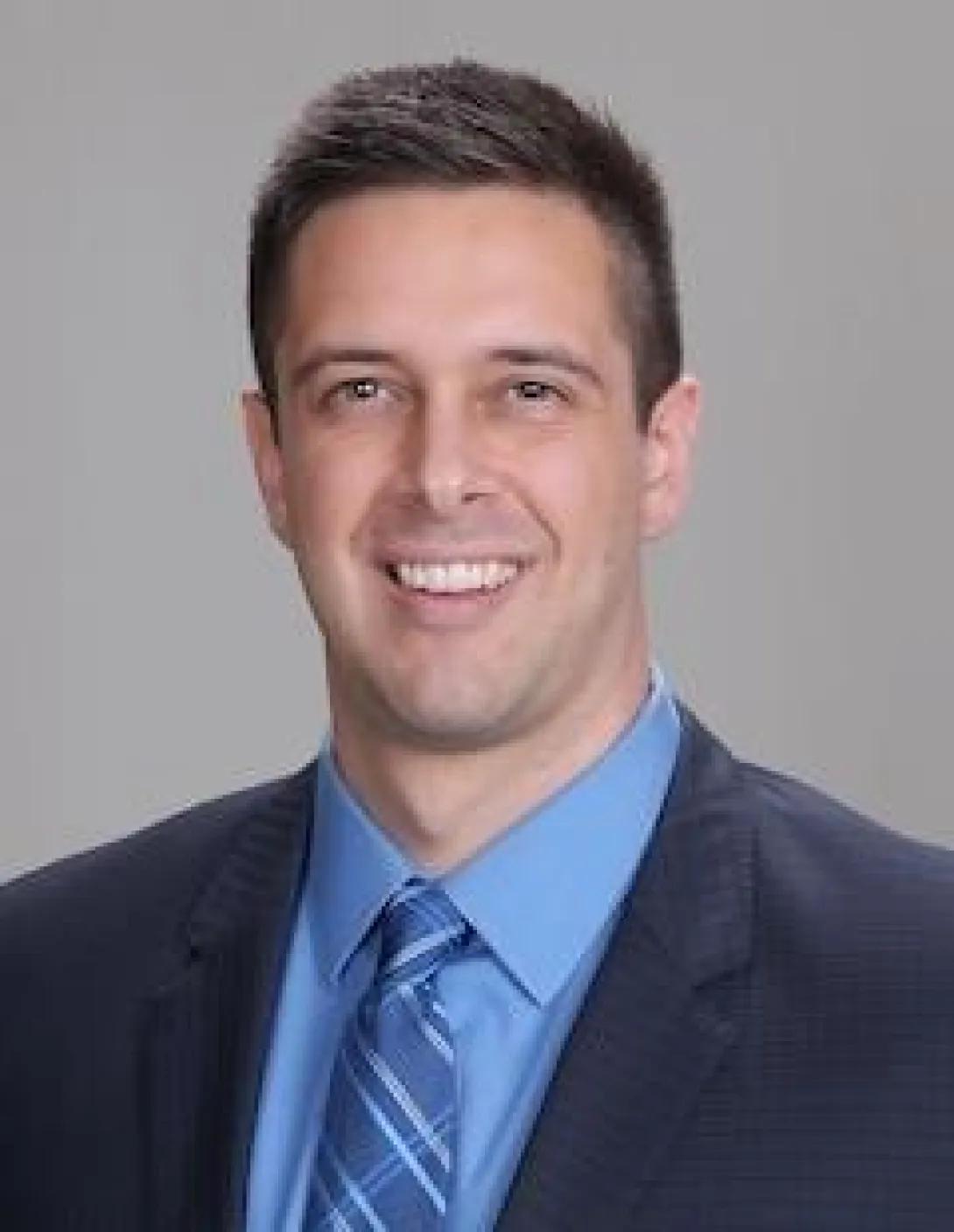 Troy Cisneros, MD