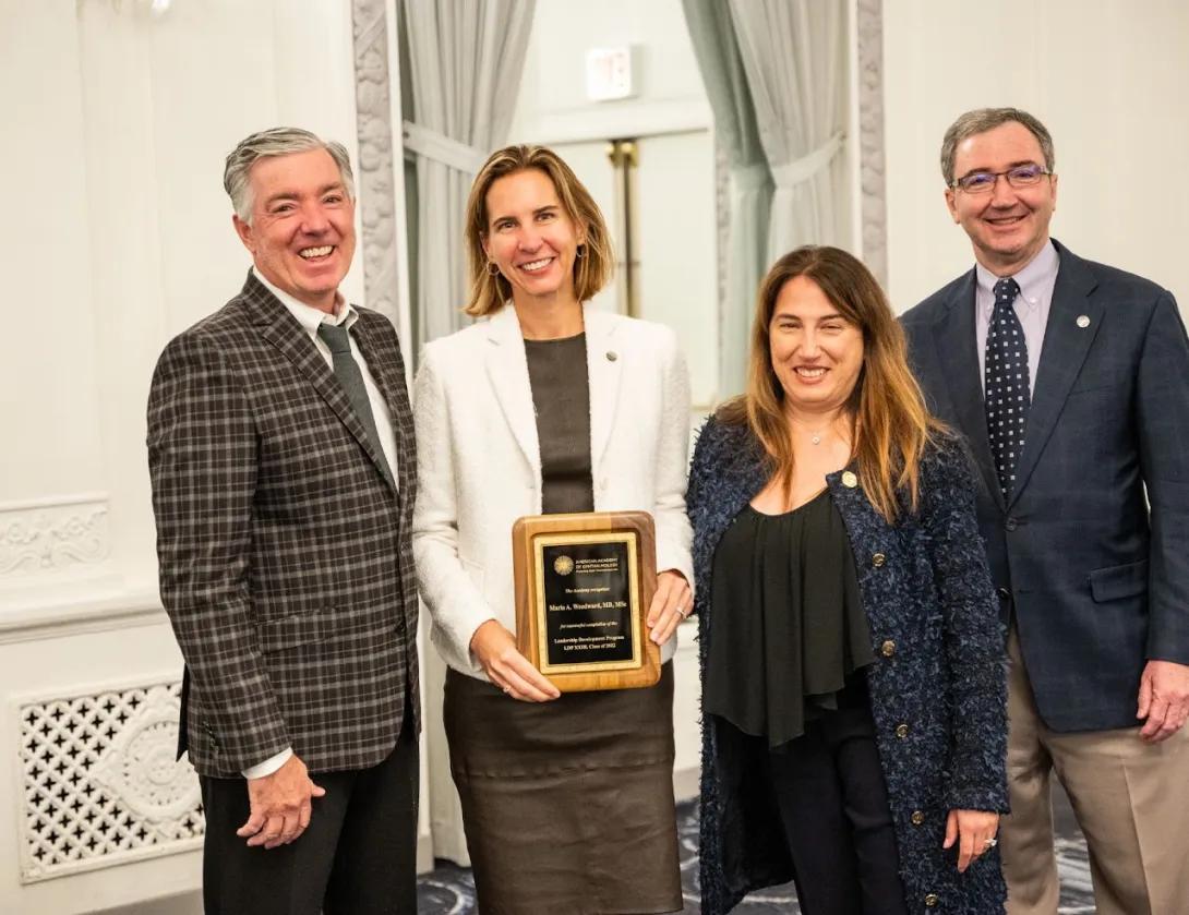 Dr. Woodward being recognized in 2022
