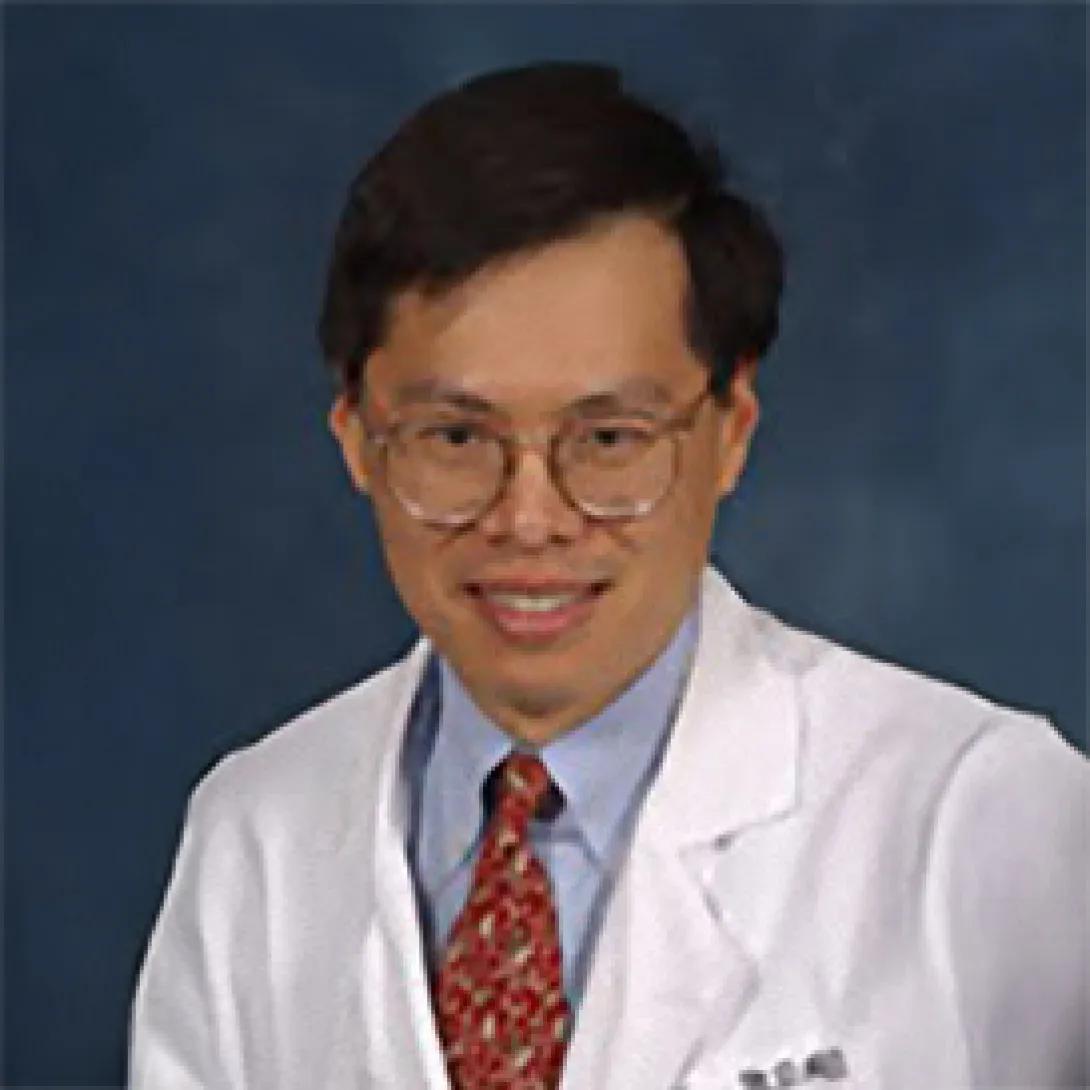 portrait of Michael Wang MD, PhD