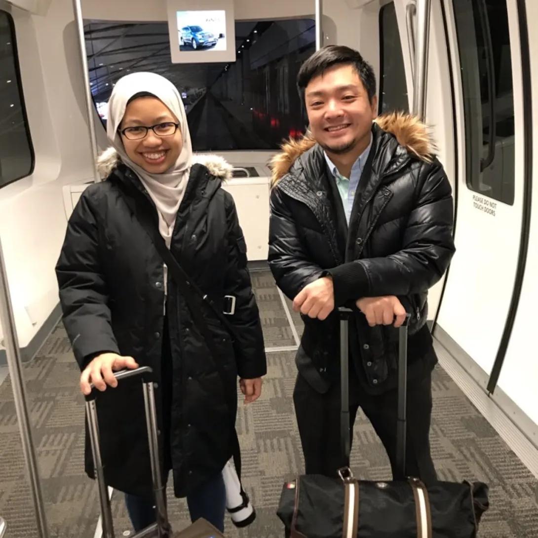 Team members with suitcases traveling to AASLD 2019