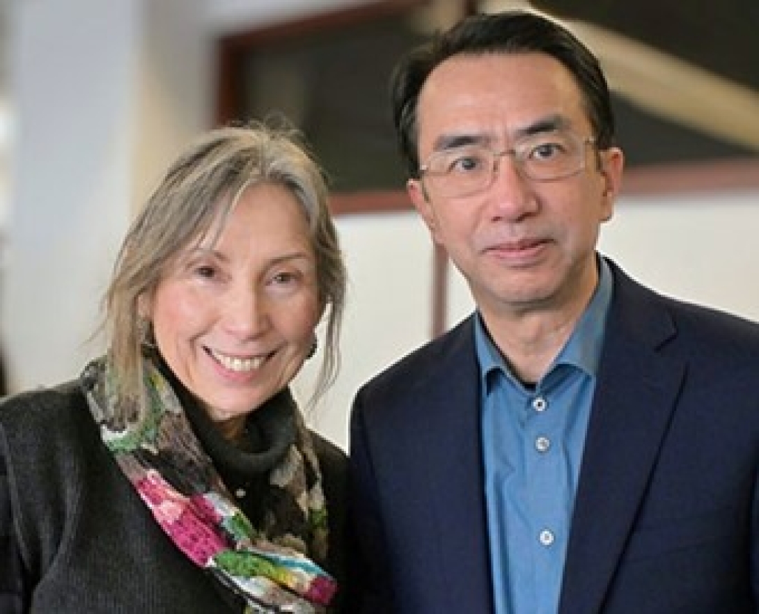 Dr. Merajver with fellow physicist Dr. Jun Li at farewell reception