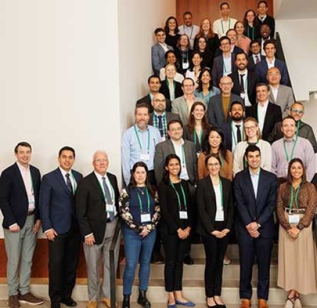 Group photo of Dr. Angel Qin with colleagues at the 2023 LUNGevity Fall Science Meeting to discuss breakthroughs in lung oncology and the future of the field