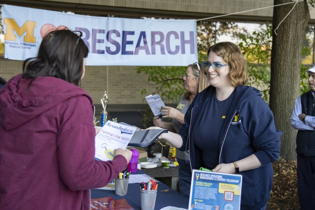 Office of Research staff helping Researchpalooza attendees