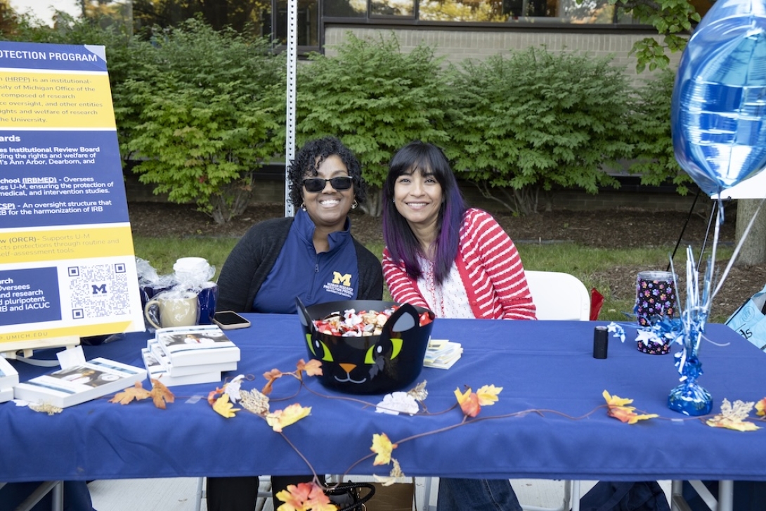 Staff at a Researchpalooza booth