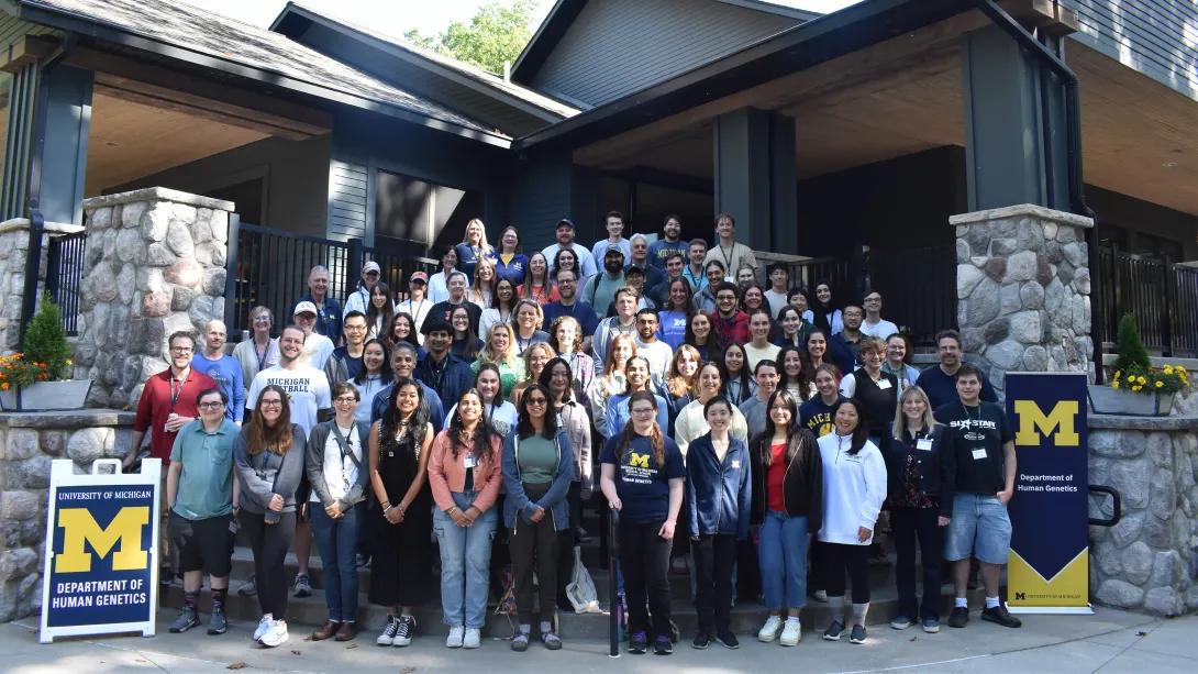 large group of diverse faculty, students and staff