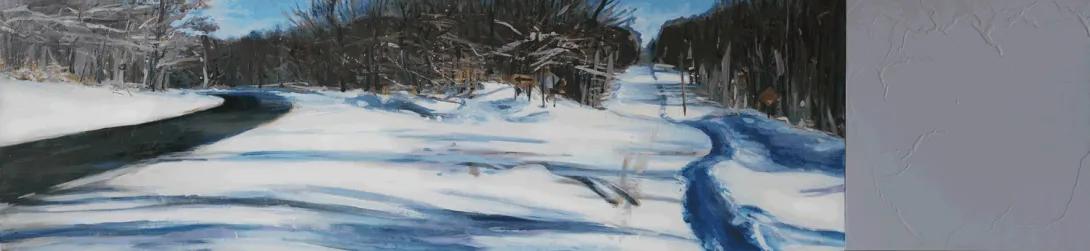 Panoramic winter landscape with a snow-covered road curving through a wooded area, a dark river running alongside it, bare trees lining the banks, and muted blue and gray tones suggesting cold, quiet conditions.