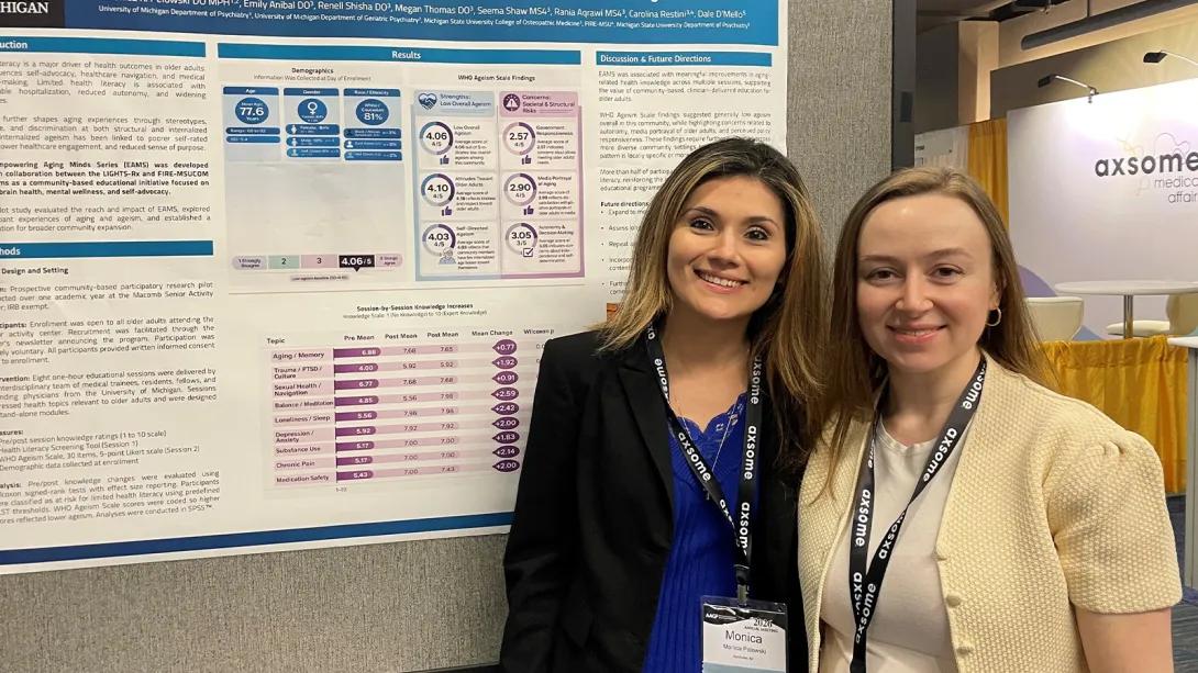 Staff at poster presentation