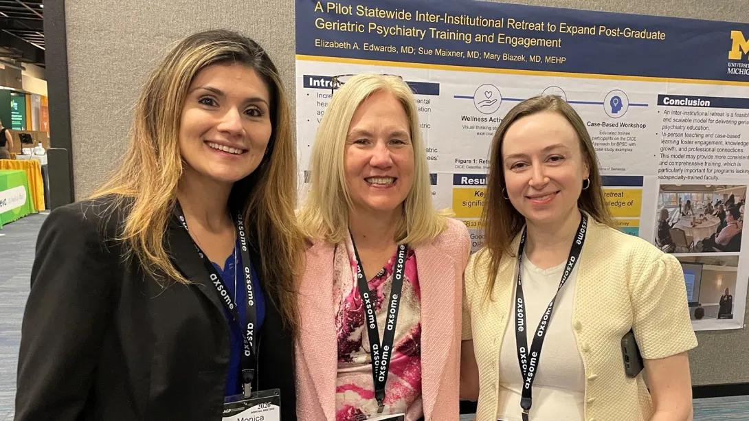 Group of staff at poster presentation