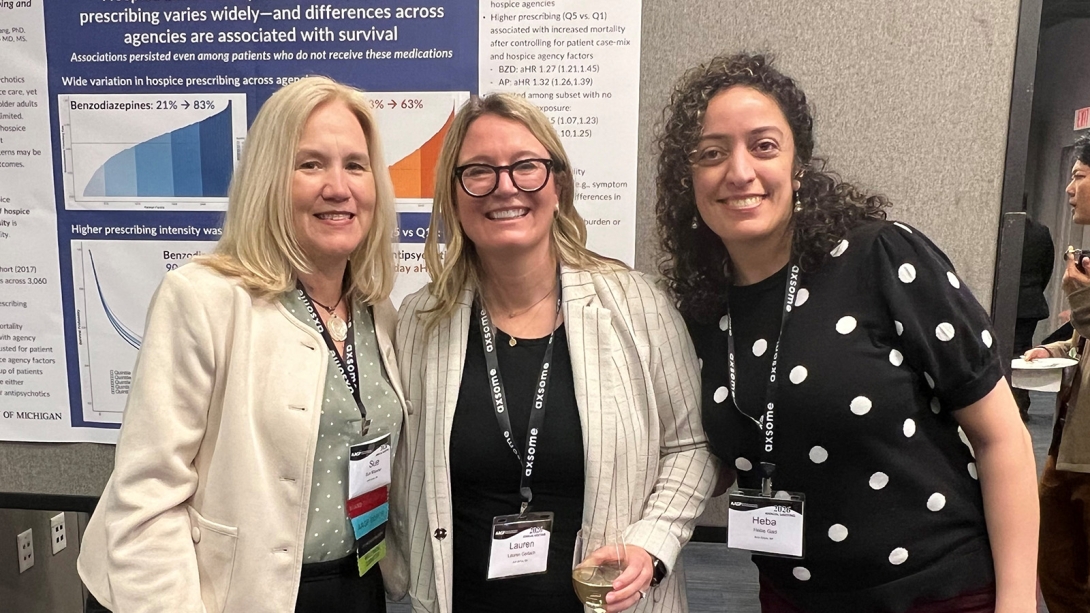 Group of staff at poster presentation