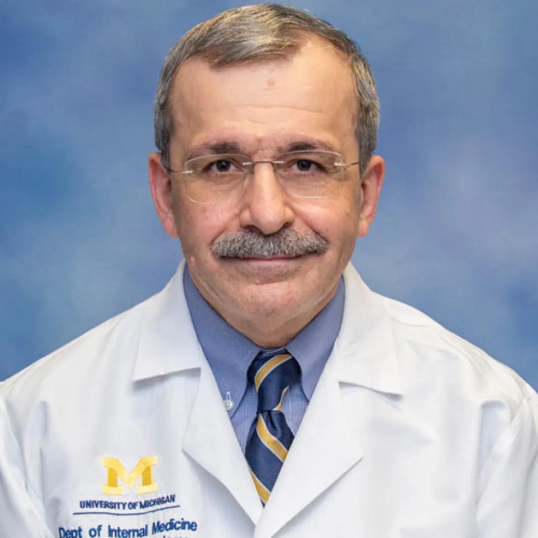 Imad Shureiqi portrait in white coat