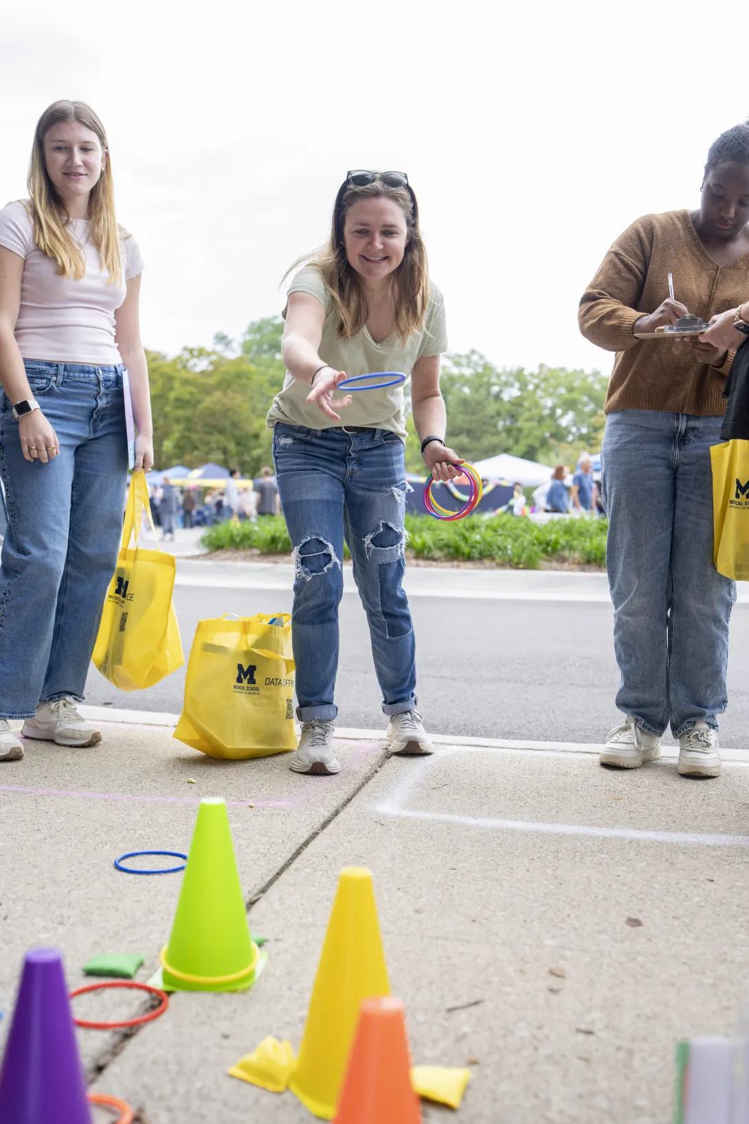 people playing a game at a tabling event outdoors